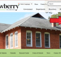 Image of the City's Website with an arrow pointing to the right side showing the live chat feature.