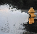 Fire hydrant being flushed