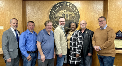 Newberry City Manager Mike New, Newberry Commissioners Mark Clark and Monty Farnsworth, Newberry Mayor Jordan Marlowe, Archer Ma