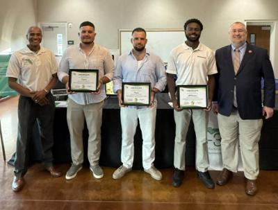 The MOOchanics and Profeed teams with their program completion certificates.