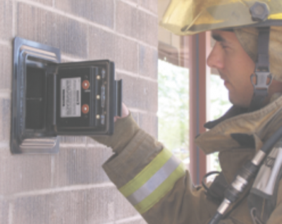 Firefighter using a knox box